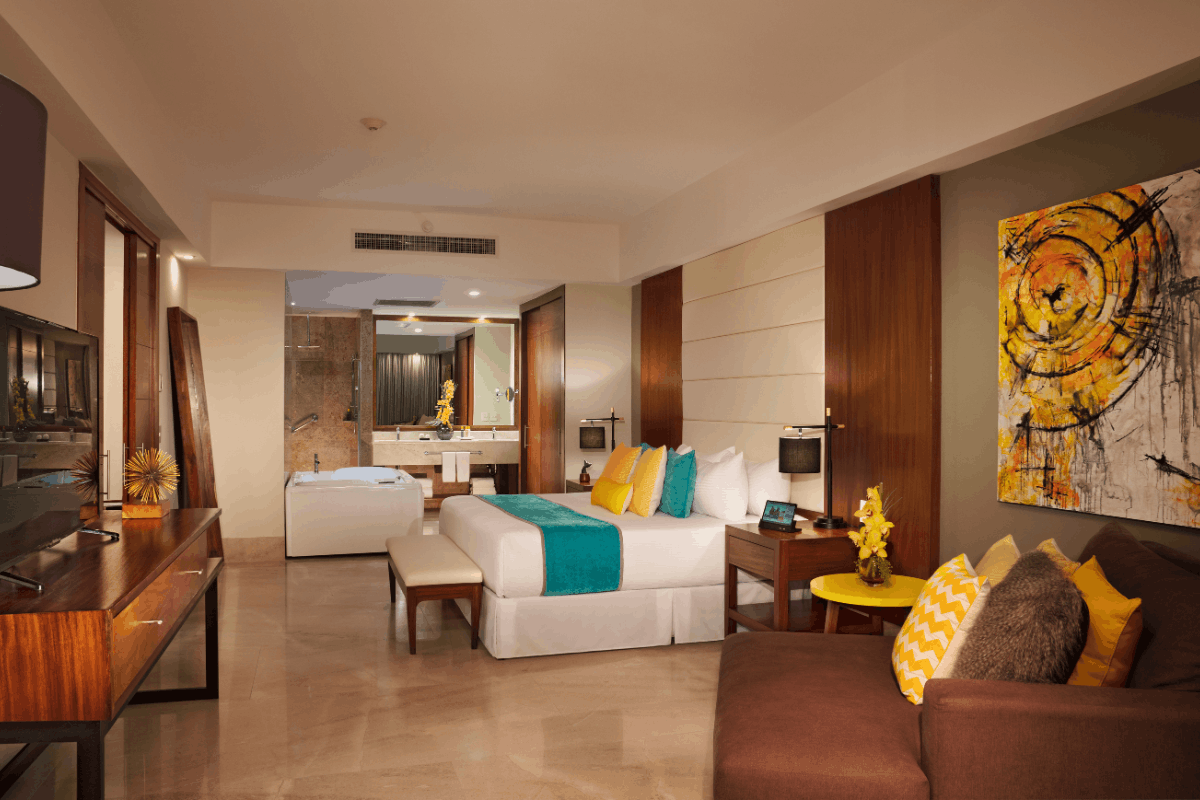 Altitude Presidential Suite ocean view at Krystal Grand Los Cabos with spacious bedroom, living area, jacuzzi and elegant design.